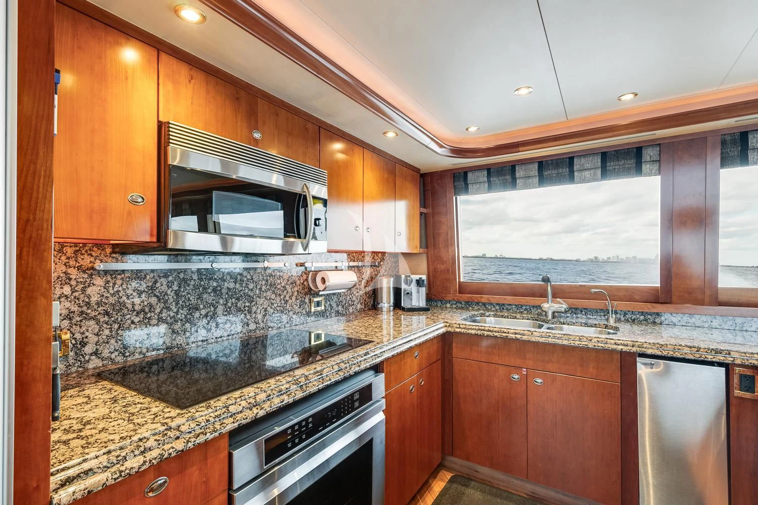 a kitchen with a marble counter top aboard MY WAY Yacht for Sale