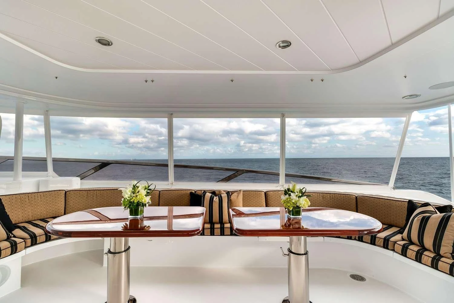 a room with a table and chairs aboard MY WAY Yacht for Sale