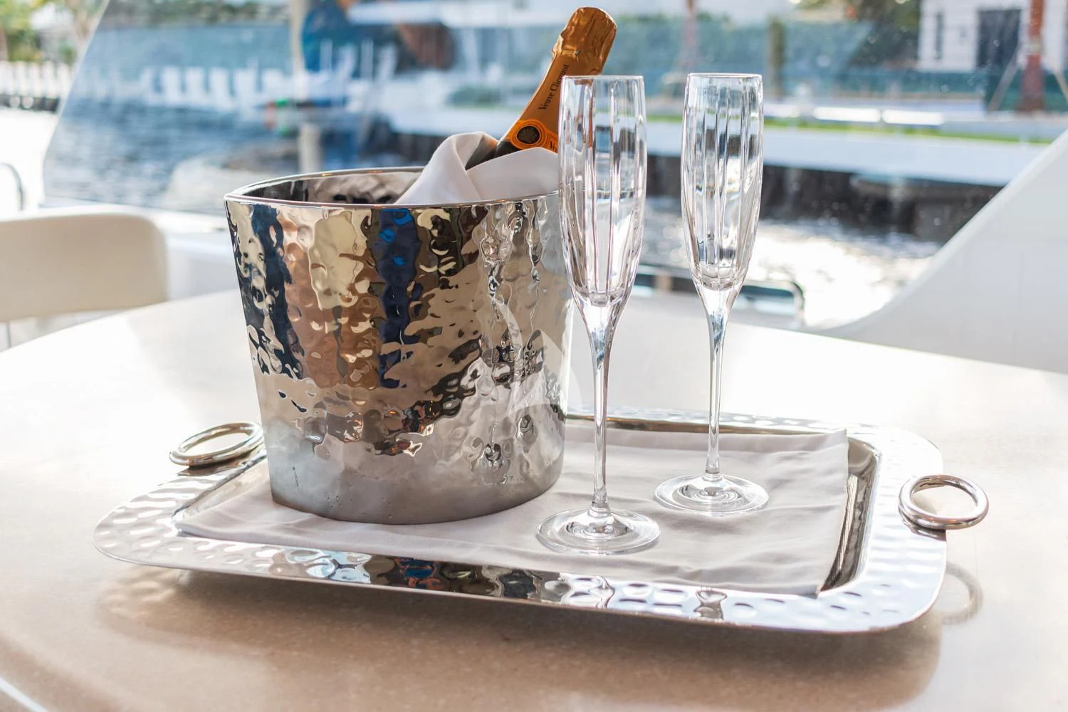 a cup and a spoon on a table aboard MY WAY Yacht for Sale