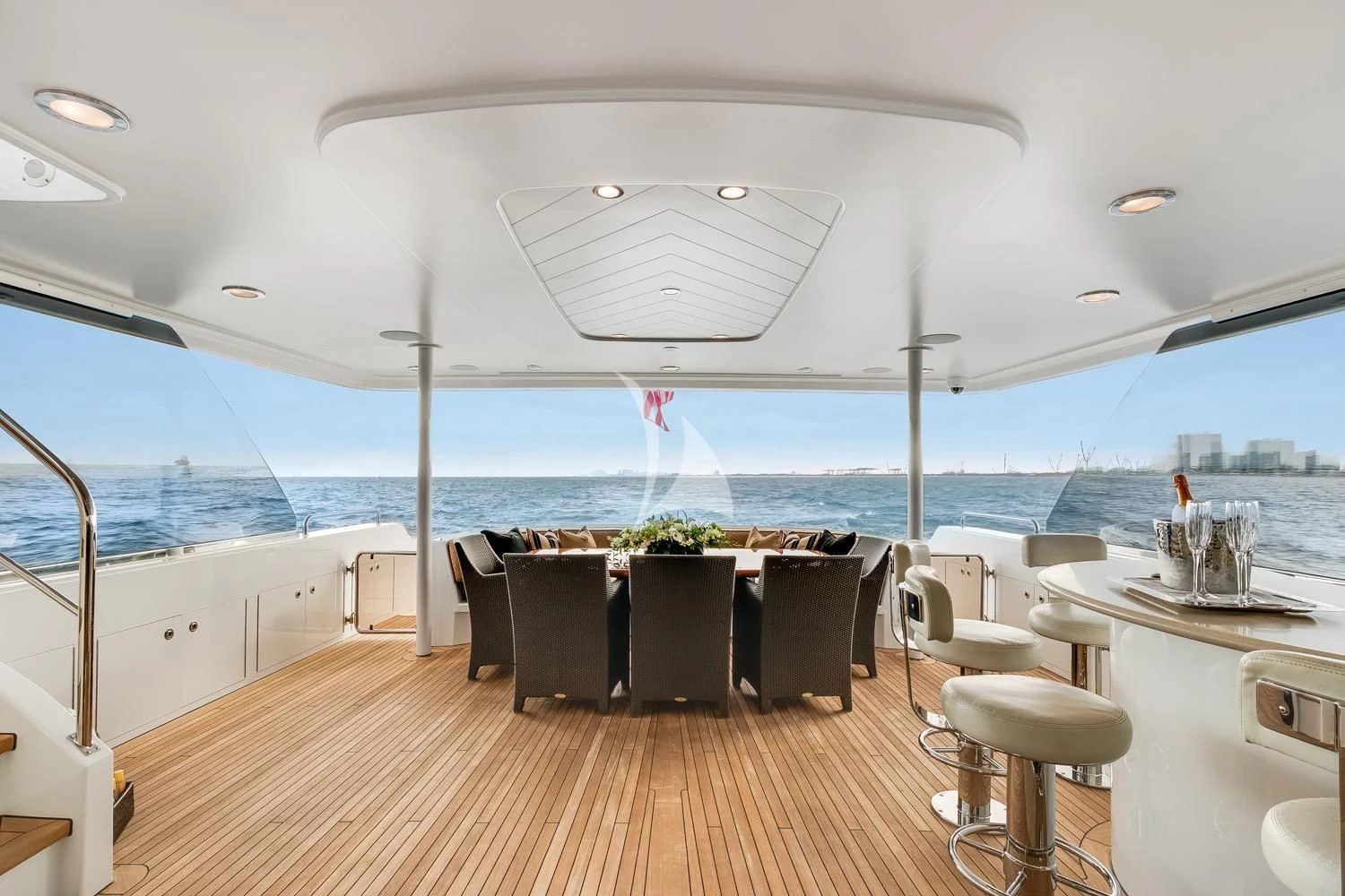a room with a table and chairs aboard MY WAY Yacht for Sale