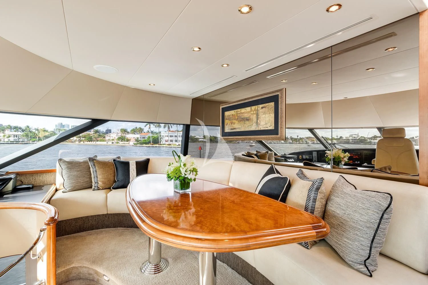 a living room with a table and couches aboard MY WAY Yacht for Sale
