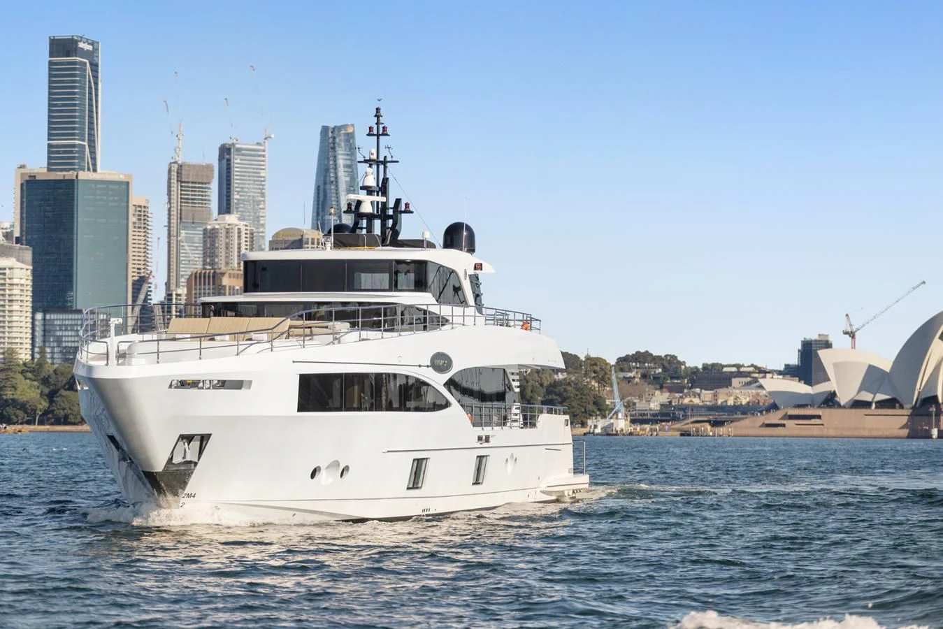 a white boat in the water aboard LEGACY Yacht for Sale