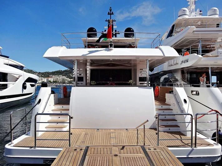 a boat docked at a pier aboard LEGACY Yacht for Sale