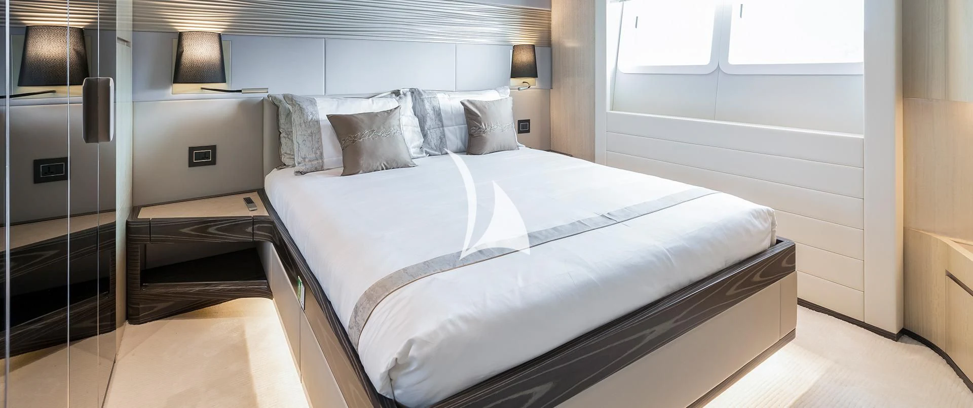 a bed in a room aboard LEGACY Yacht for Sale