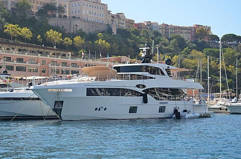 a couple of boats in a harbor aboard LEGACY Yacht for Sale