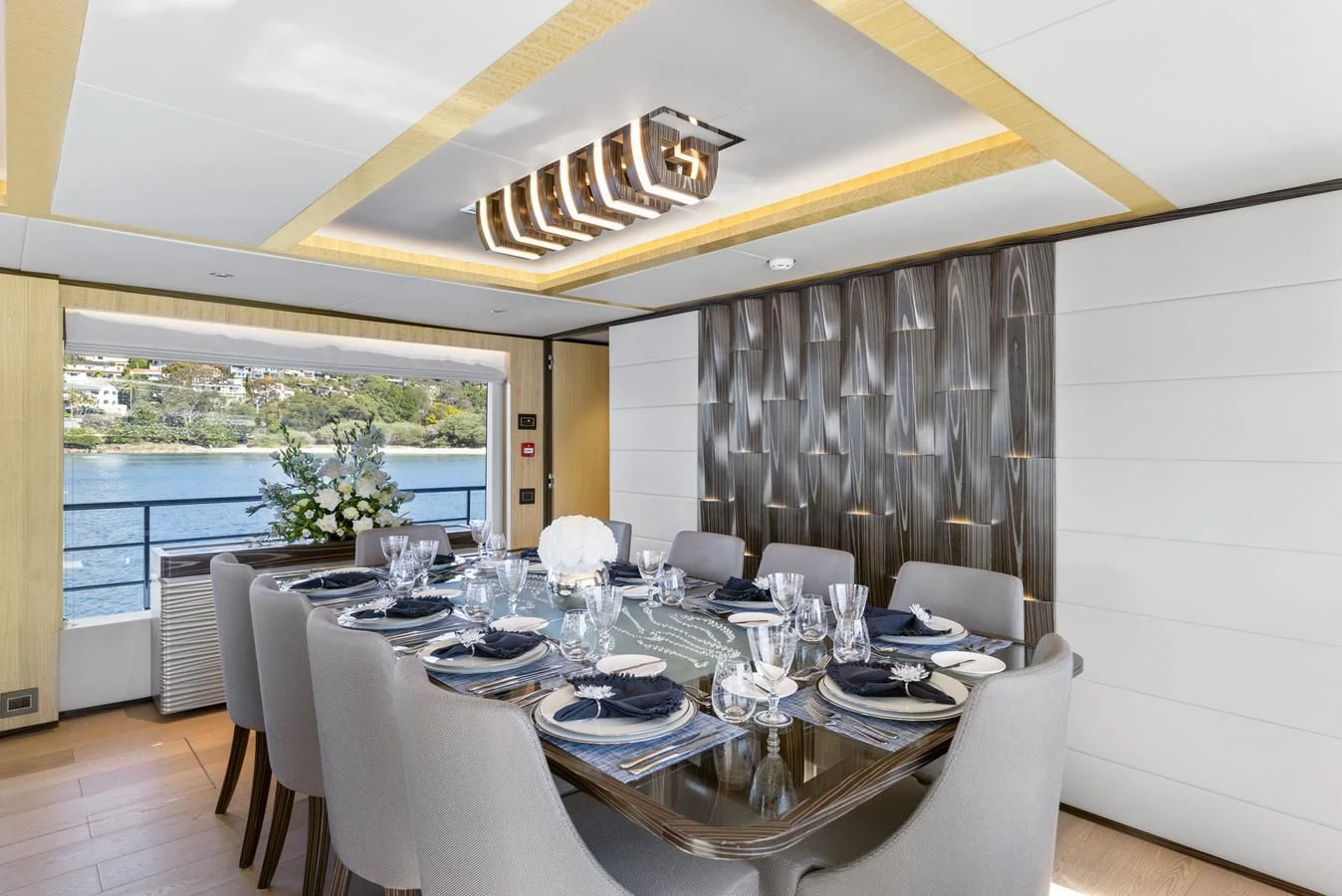 a dining room with a large table aboard LEGACY Yacht for Sale