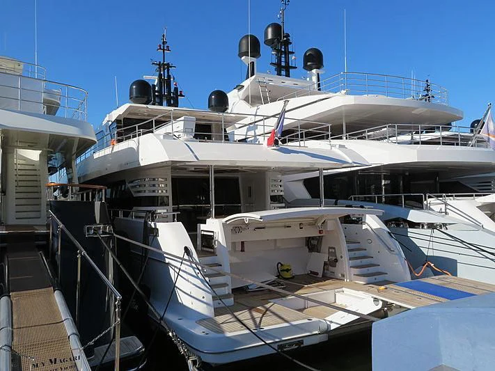 a large white boat docked aboard LEGACY Yacht for Sale