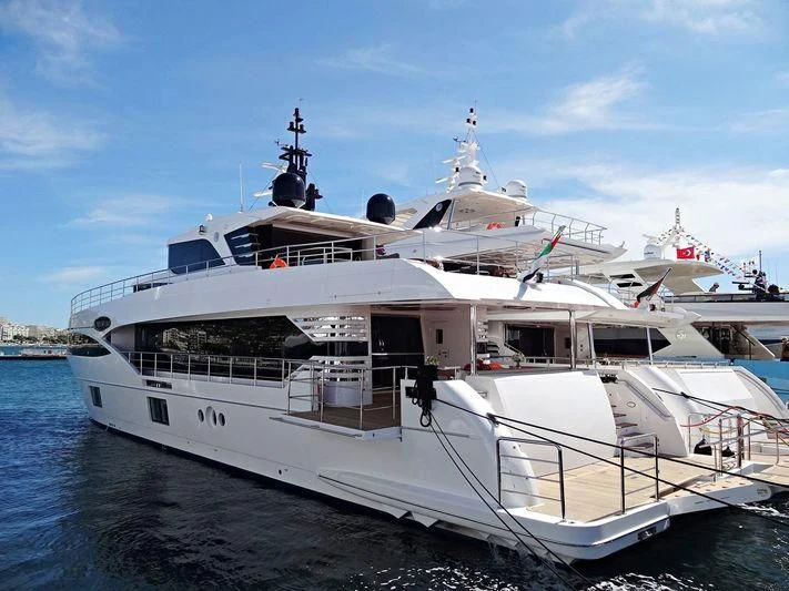 a large white boat aboard LEGACY Yacht for Sale