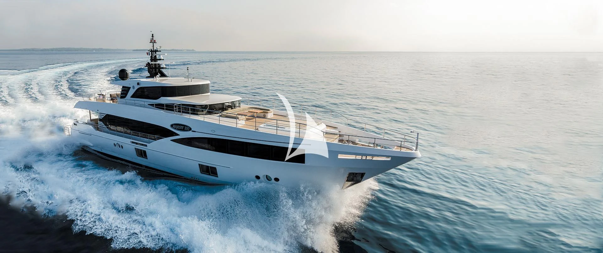 a white yacht in the ocean aboard LEGACY Yacht for Sale