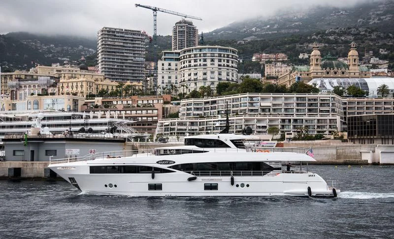 a white yacht in the water aboard LEGACY Yacht for Sale