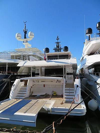 a boat docked at a pier aboard LEGACY Yacht for Sale