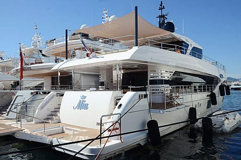 a boat docked at a pier aboard LEGACY Yacht for Sale