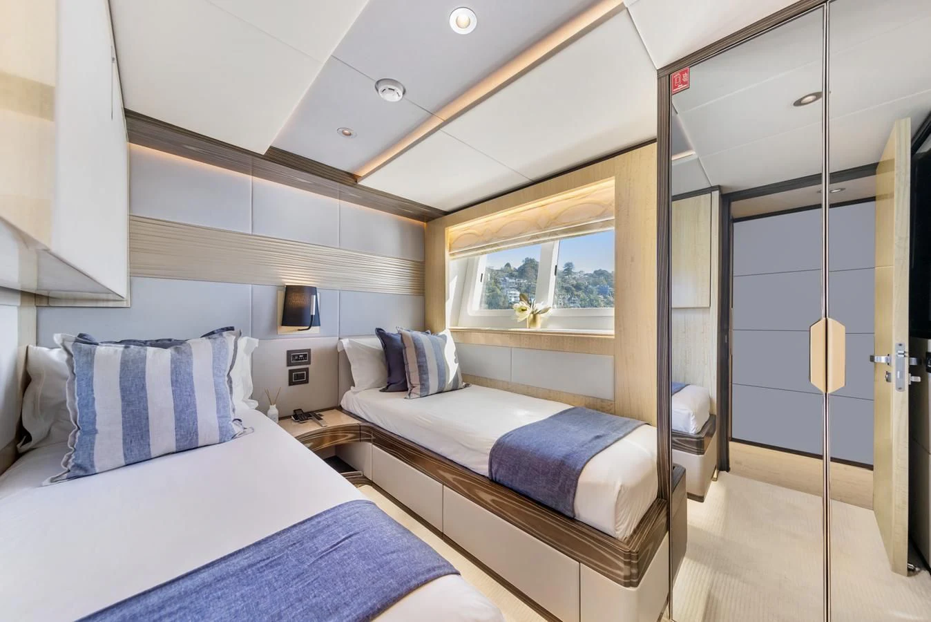 a room with two beds aboard LEGACY Yacht for Sale