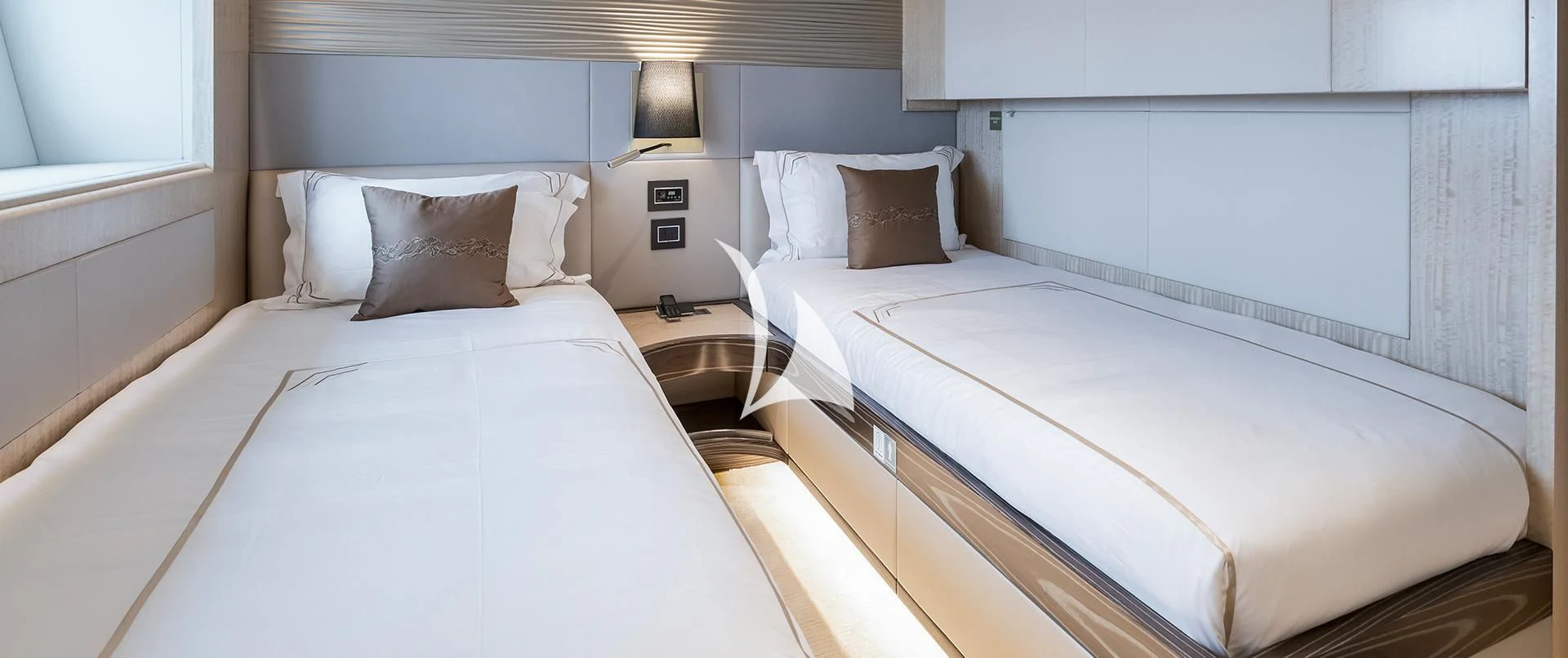a couple of beds in a room aboard LEGACY Yacht for Sale