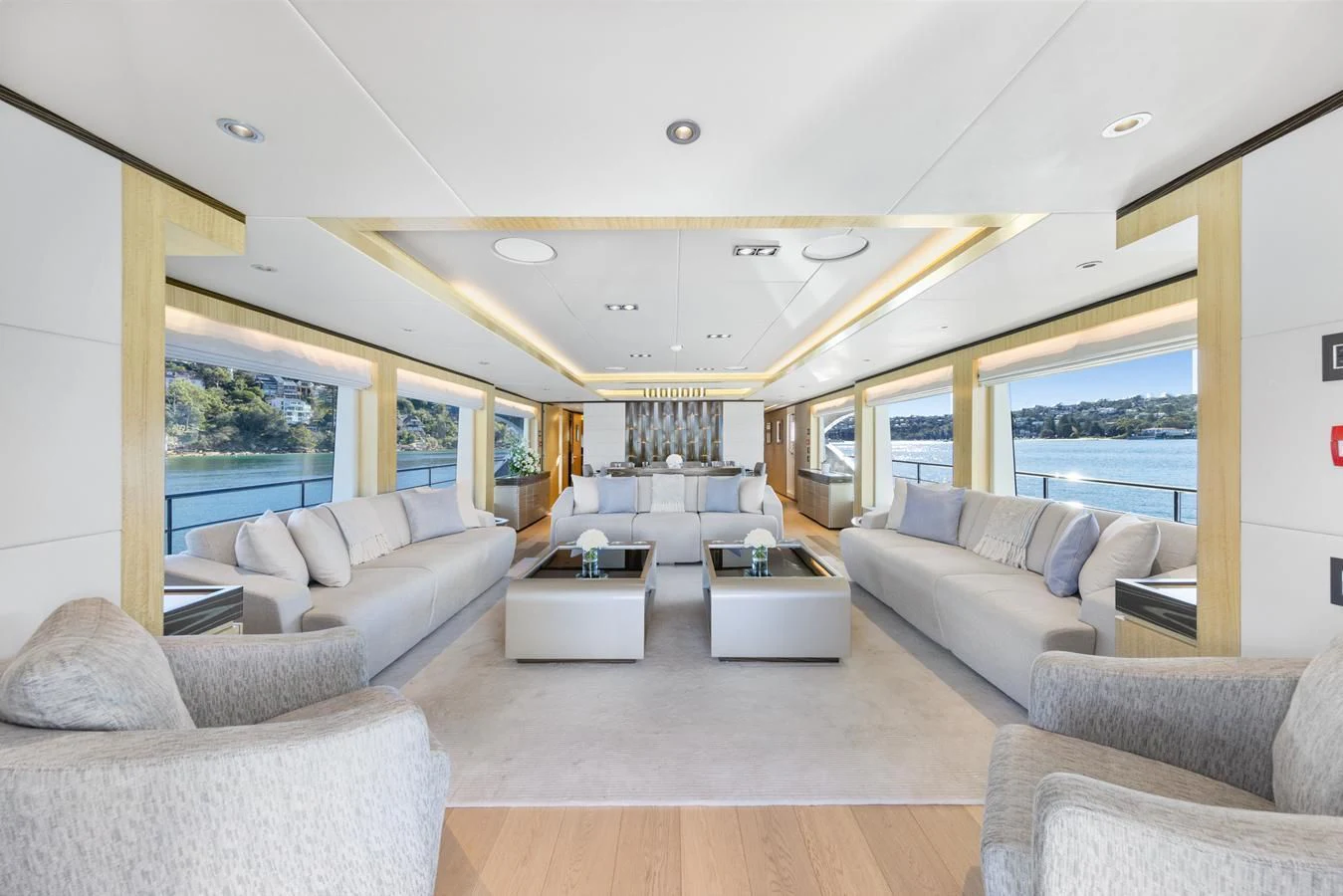 a living room with a large window aboard LEGACY Yacht for Sale