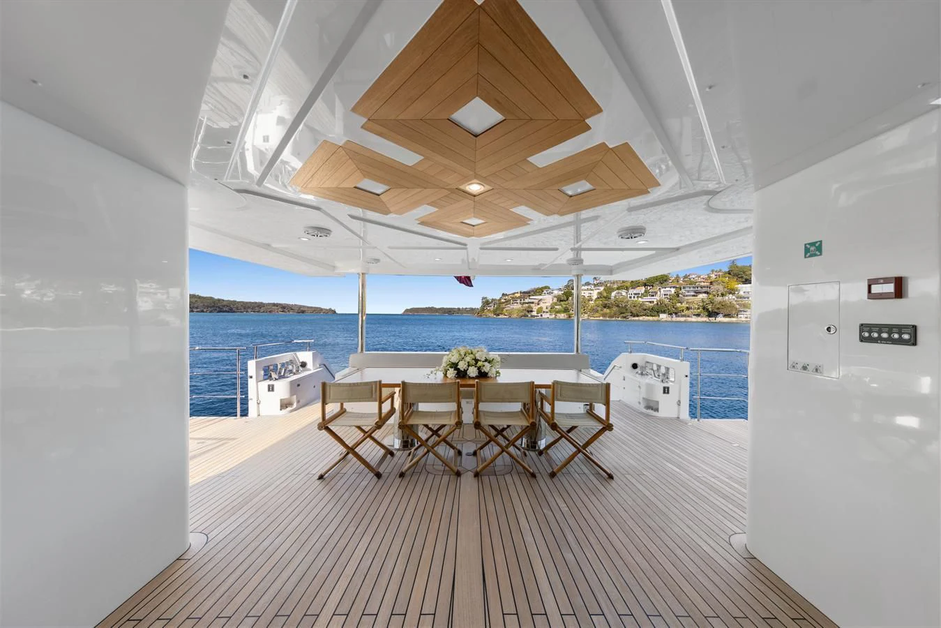 a room with tables and chairs aboard LEGACY Yacht for Sale