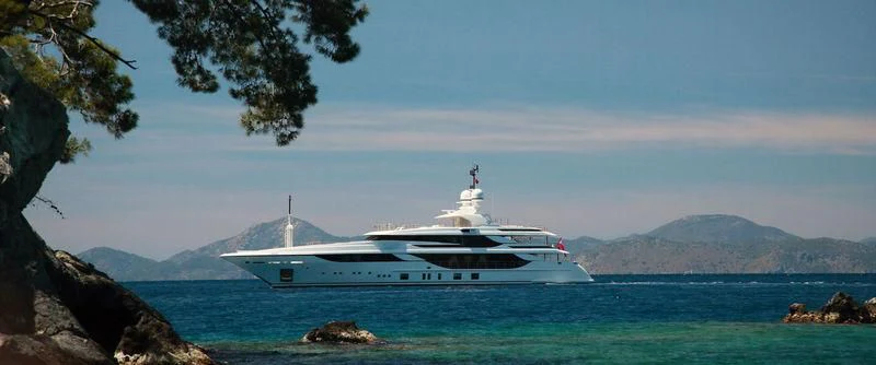 a white boat in the water aboard VICA Yacht for Sale