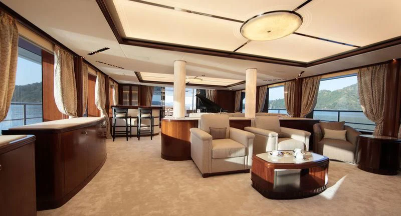 a large living room with a large window aboard VICA Yacht for Sale