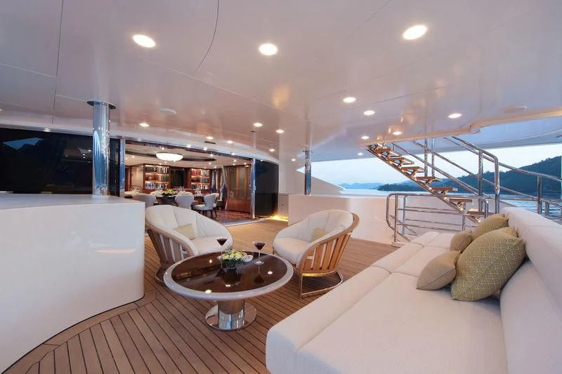 a living room with a large swimming pool aboard VICA Yacht for Sale