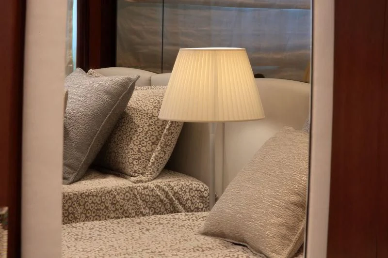 a bed with pillows aboard VICA Yacht for Sale
