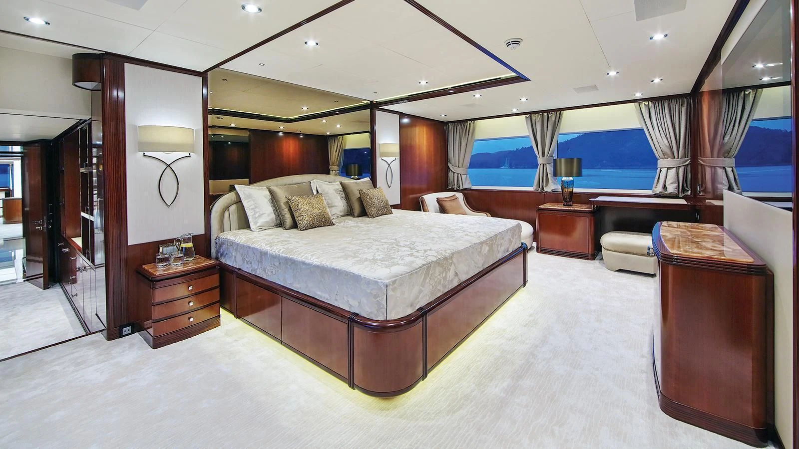 a large bed in a hotel room aboard VICA Yacht for Sale