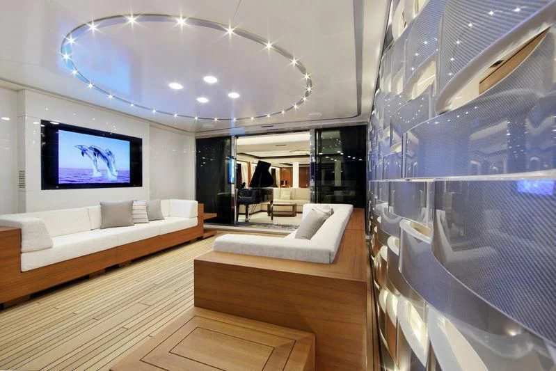 a room with a large screen aboard VICA Yacht for Sale