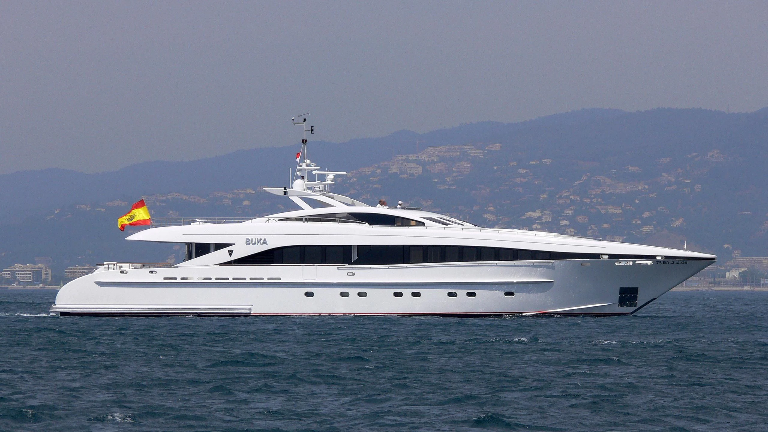 a large white ship in the water aboard BUKA U Yacht for Sale