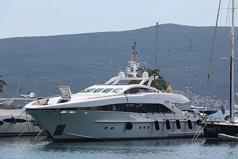 a white yacht in the water aboard BUKA U Yacht for Sale