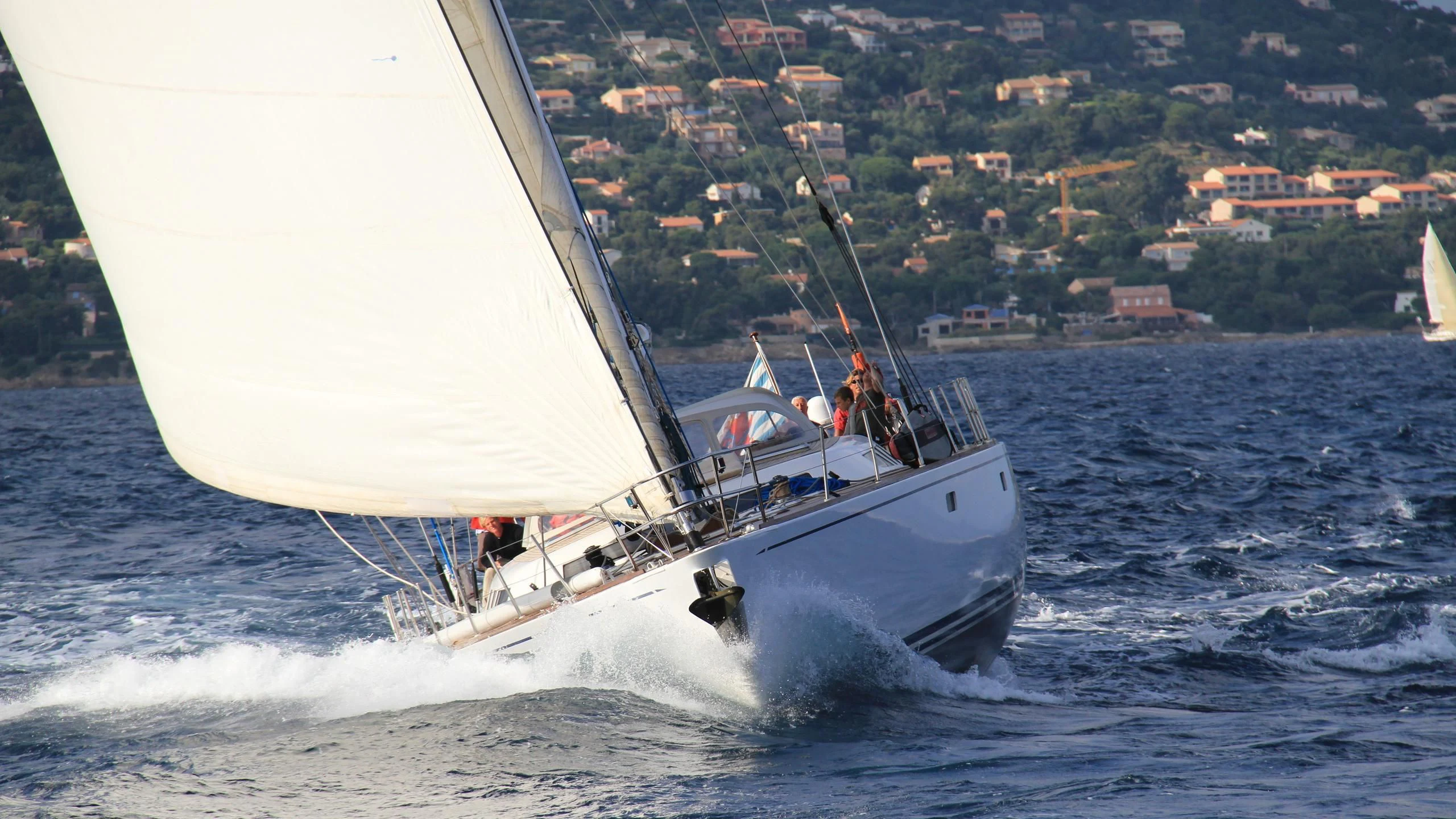 a boat sailing on the sea aboard DJANGO TOO Yacht for Charter