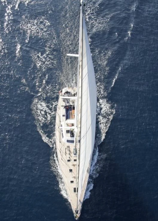a boat sailing on the water aboard DJANGO TOO Yacht for Charter