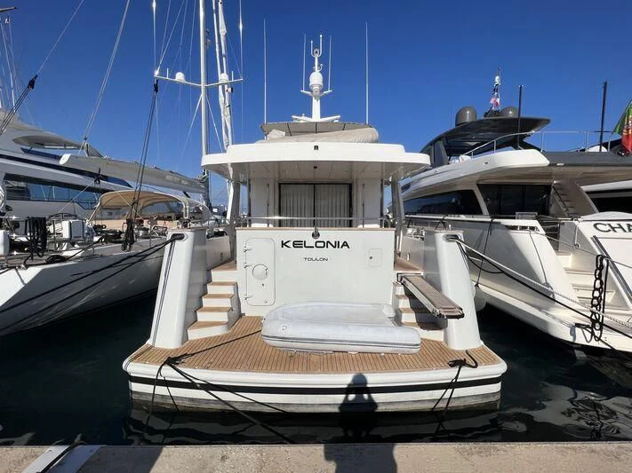 a group of boats are parked in a harbor aboard KELONIA Yacht for Sale