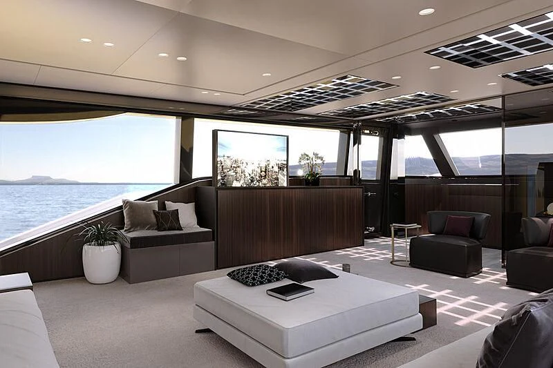 a room with a couch and a table and a large window aboard EXTRA 88/03 Yacht for Sale