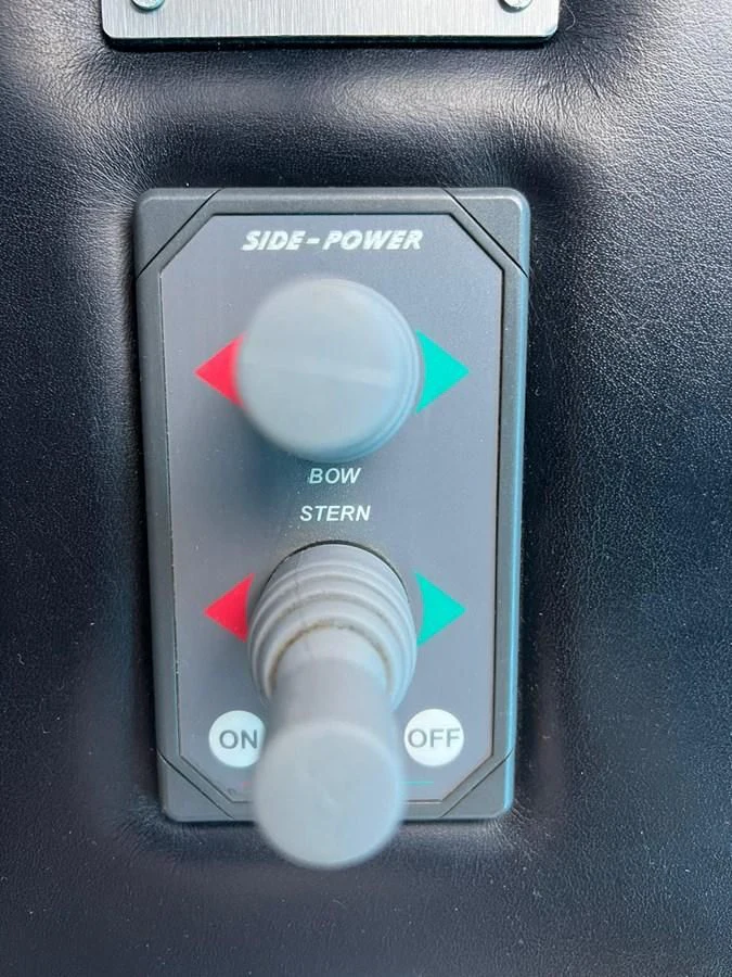 a close up of a smart watch aboard EYE Yacht for Sale