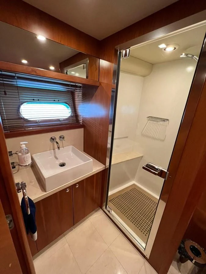 a bathroom with a sink and a shower aboard EYE Yacht for Sale