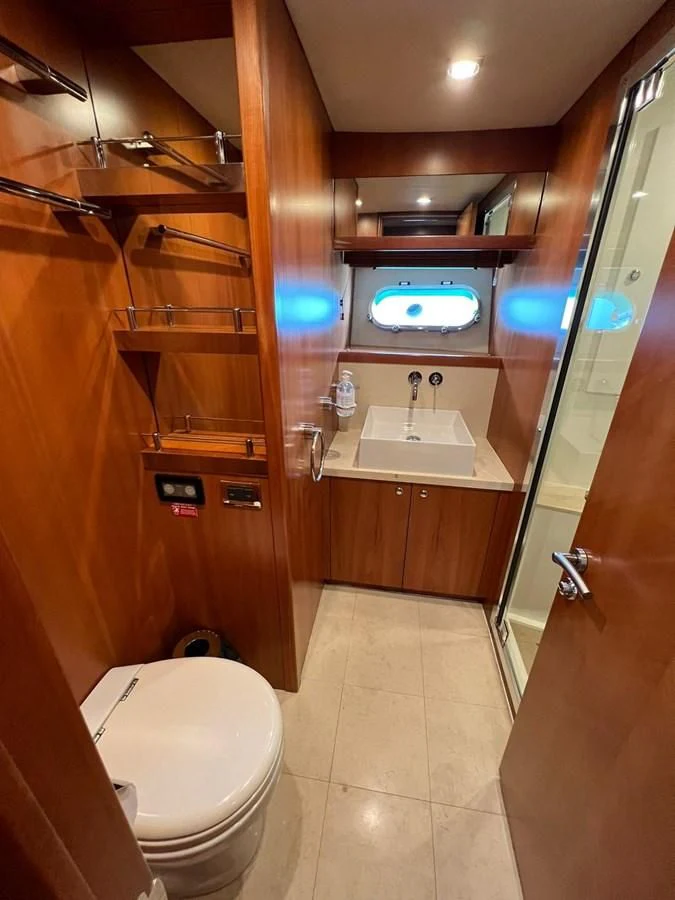 a bathroom with a sink and a toilet aboard EYE Yacht for Sale