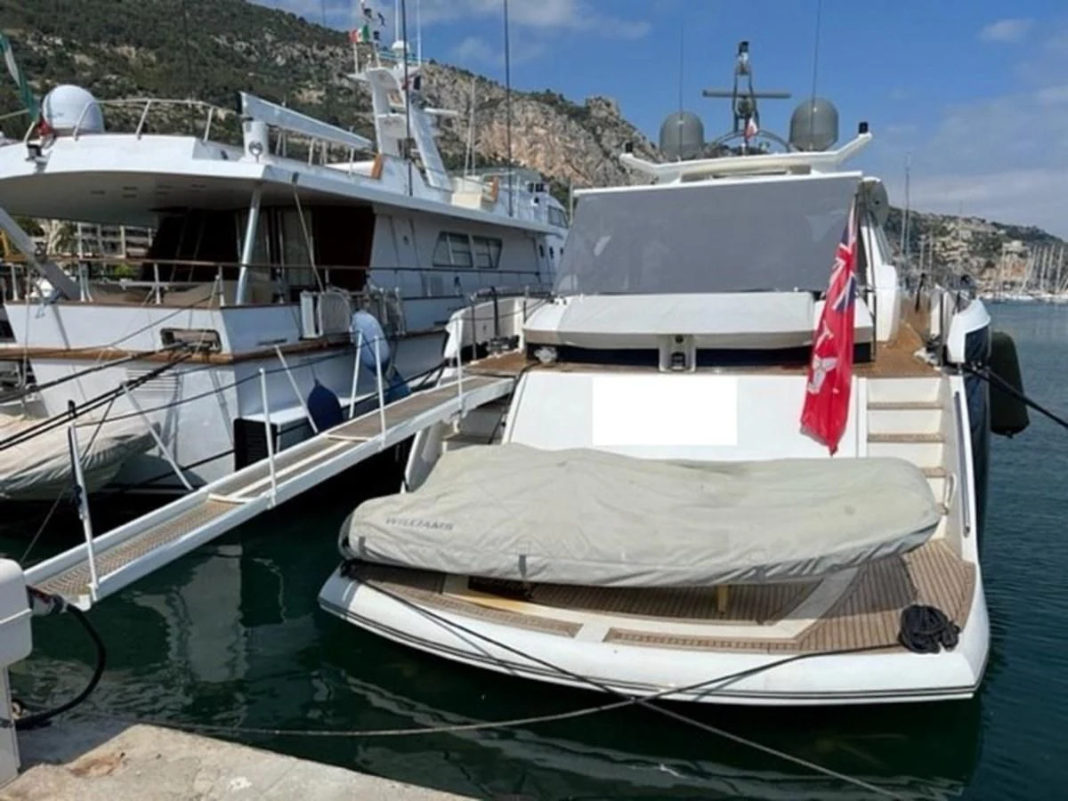 boats docked at a pier aboard EYE Yacht for Sale
