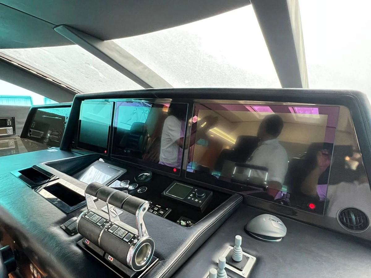 a group of people in a control room aboard EYE Yacht for Sale