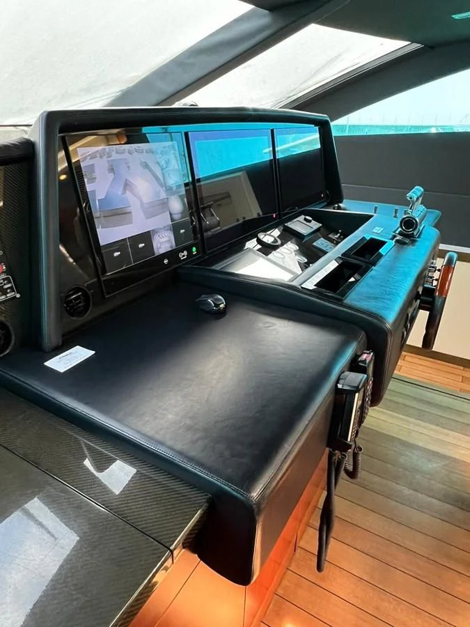 a black and blue machine aboard EYE Yacht for Sale