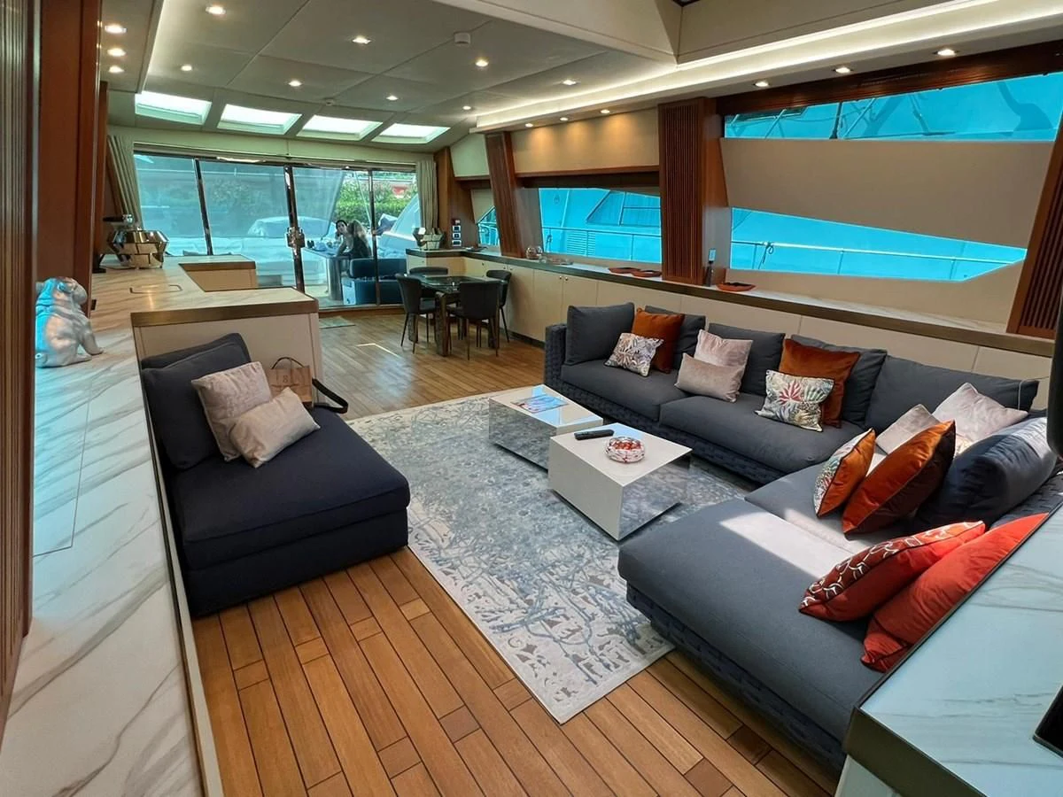 a living room with a large window aboard EYE Yacht for Sale
