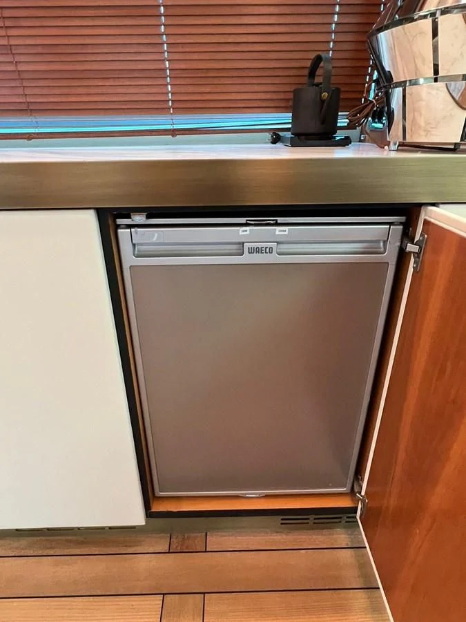 a microwave oven in a kitchen aboard EYE Yacht for Sale