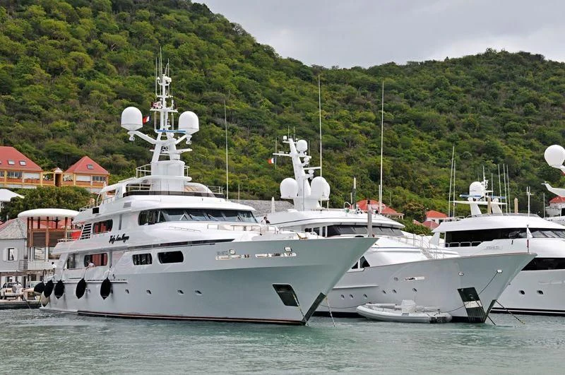 a group of boats in a harbor aboard LADY ANN MAGEE Yacht for Sale