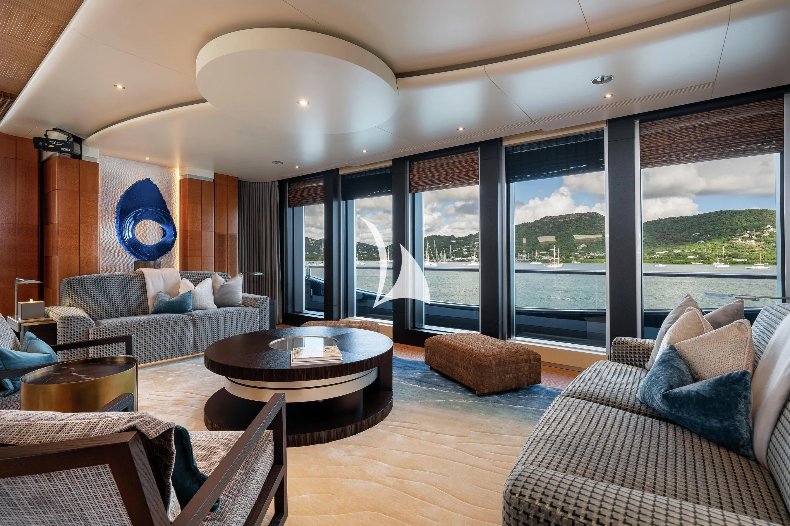 a living room with a large window aboard BARBARA Yacht for Charter