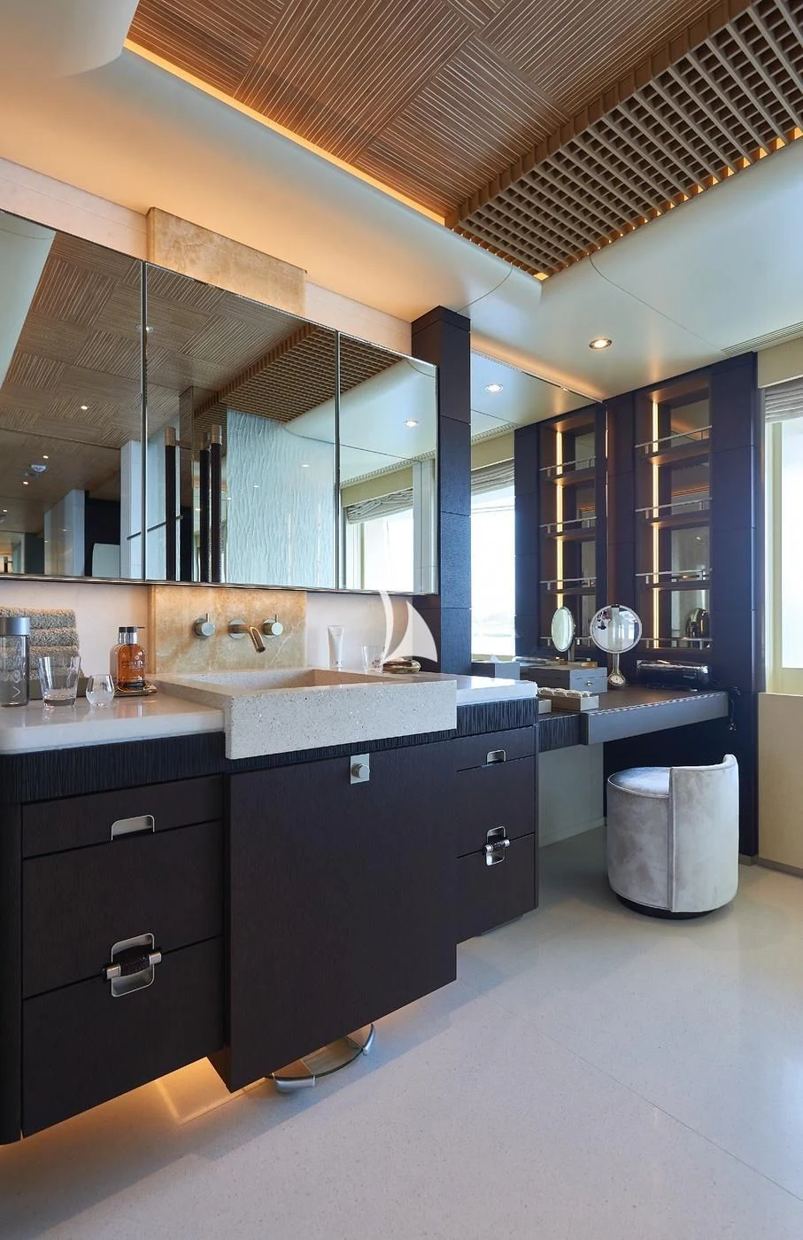 a bathroom with a large mirror aboard BARBARA Yacht for Charter