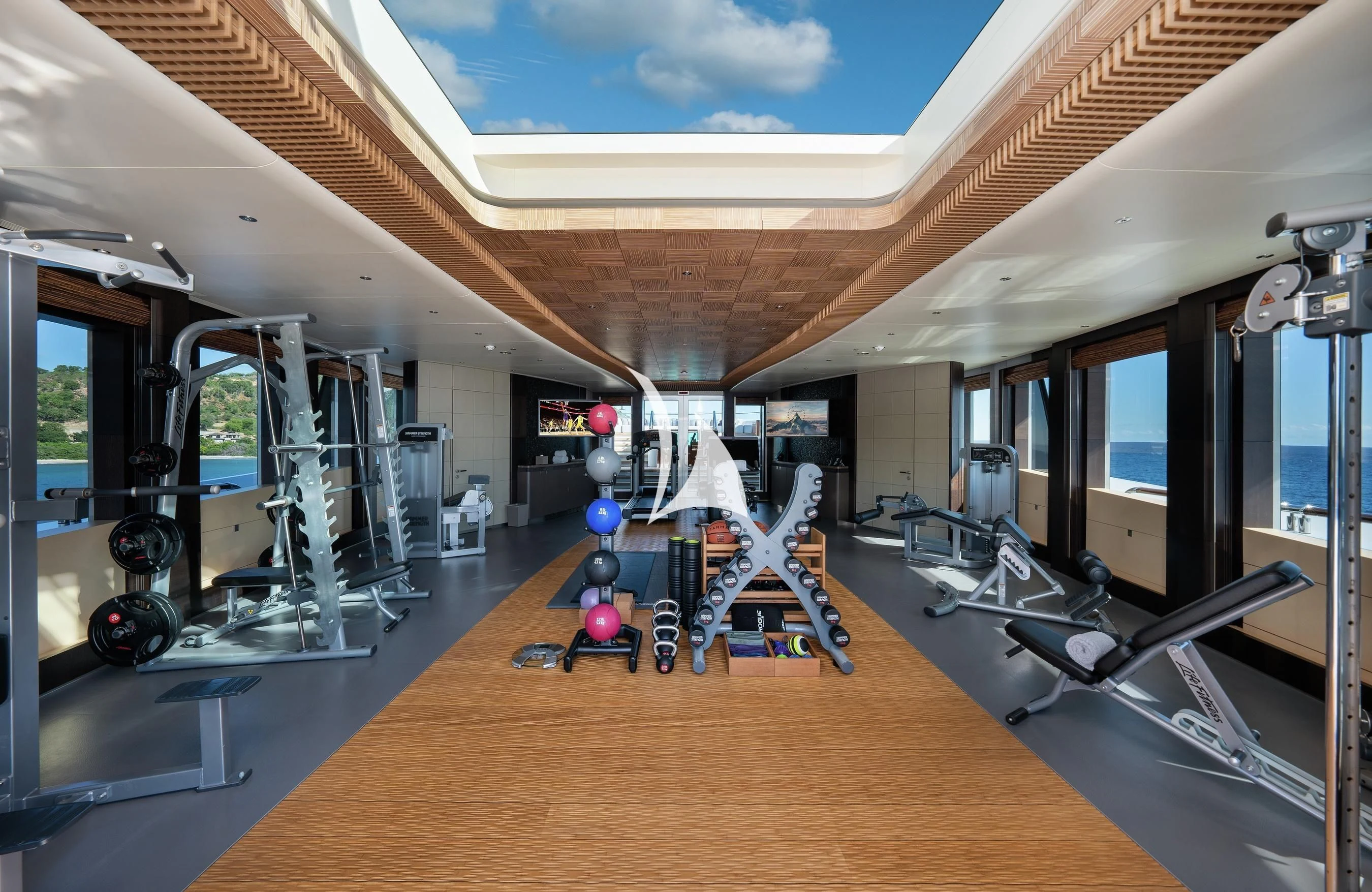 a gym with equipment and equipment aboard BARBARA Yacht for Charter