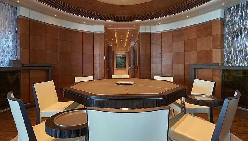 a room with tables and chairs aboard BARBARA Yacht for Charter