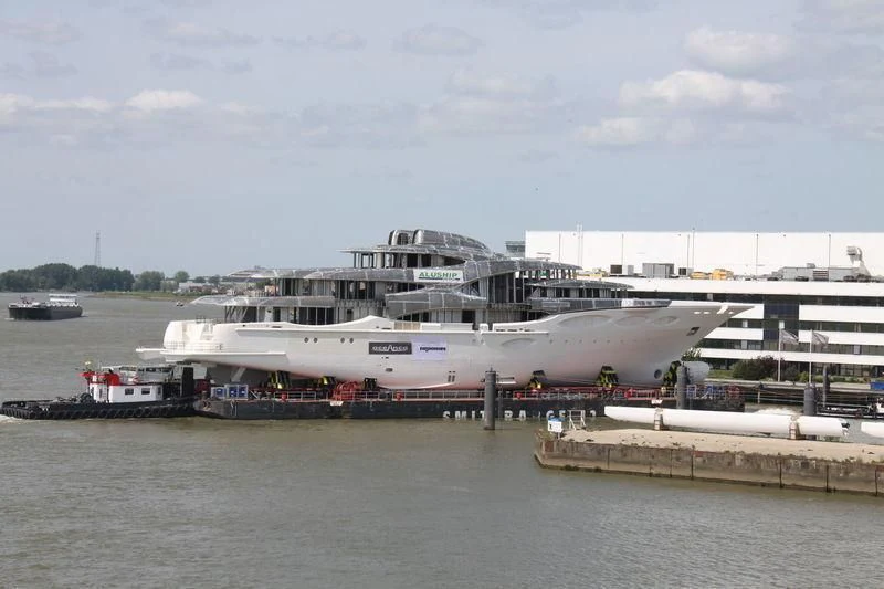 a large ship docked aboard BARBARA Yacht for Charter