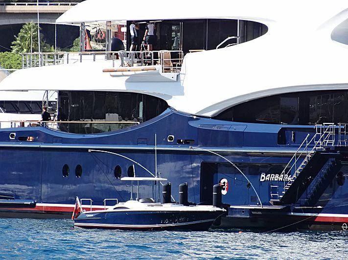 a couple of boats are parked in the water aboard BARBARA Yacht for Charter