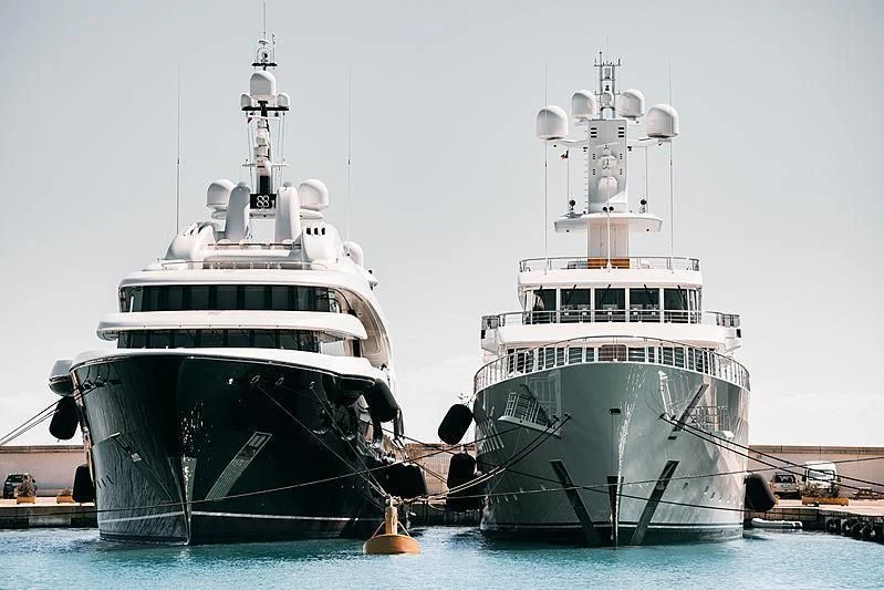 a couple of large boats in the water aboard BARBARA Yacht for Charter