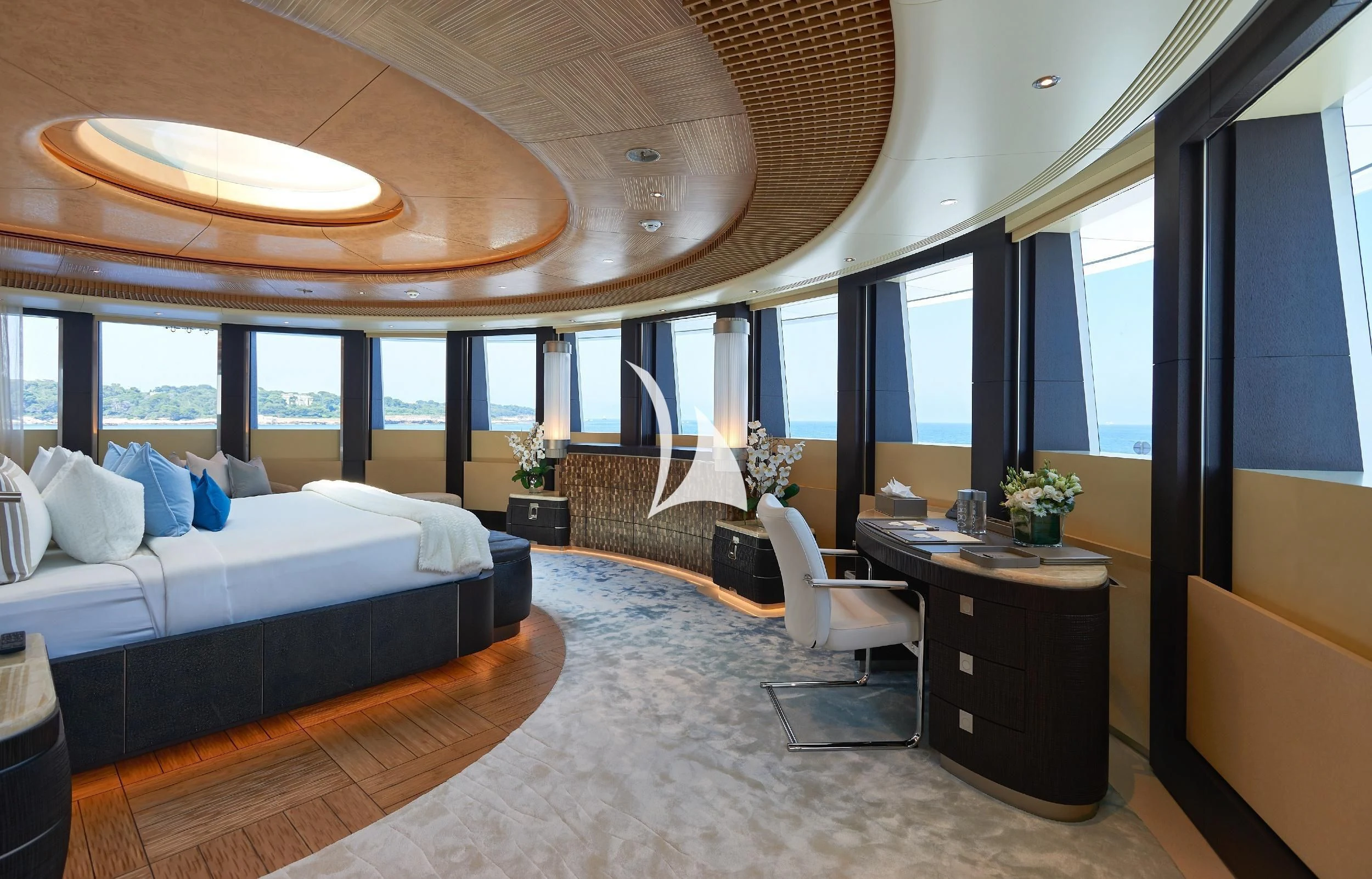 a room with a bed and a desk aboard BARBARA Yacht for Charter