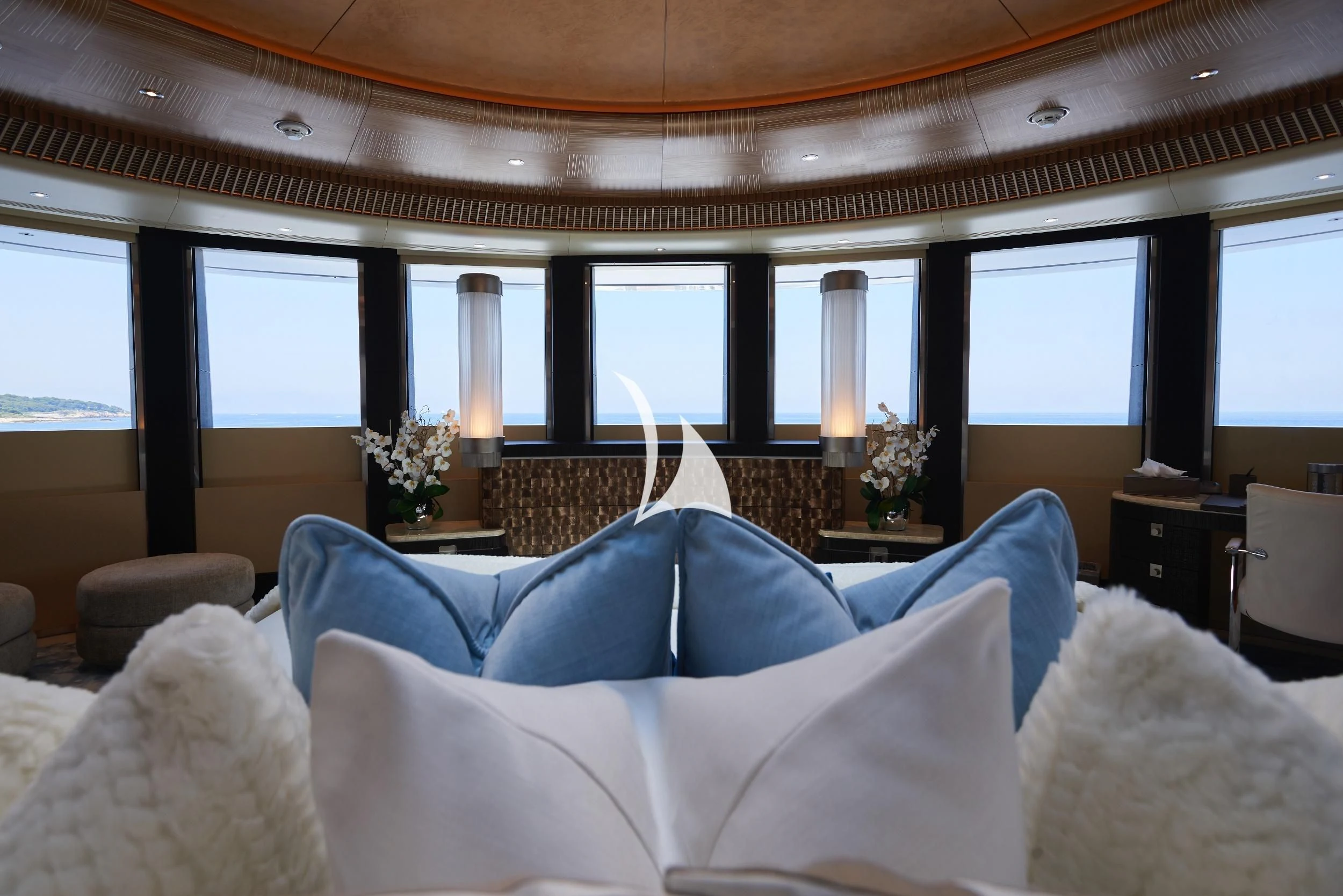 a large living room with a large window aboard BARBARA Yacht for Charter